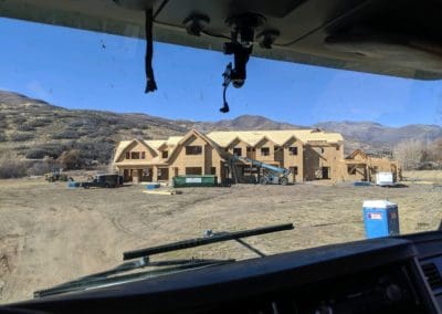 view of an under construction house from the car