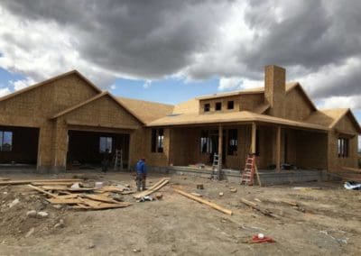 men working at an under construction house